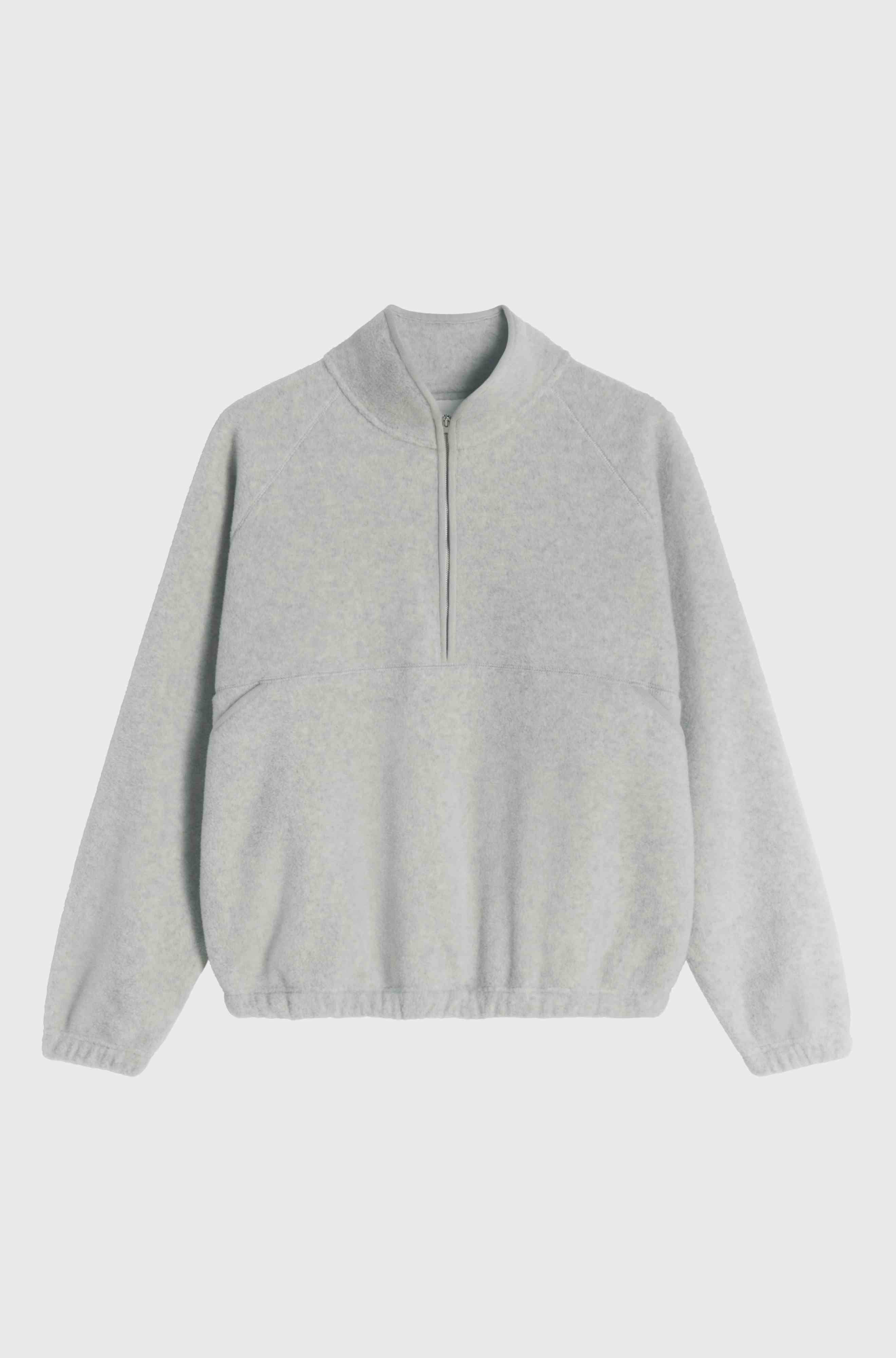 Light gray zip-up sweatshirt on a light gray background