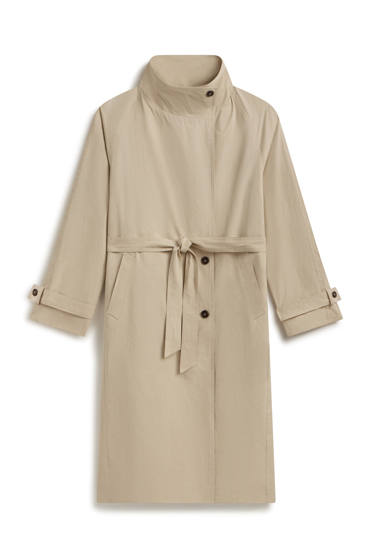 Beige high neck trench coat with wrap belt and button up front against a light grey wall