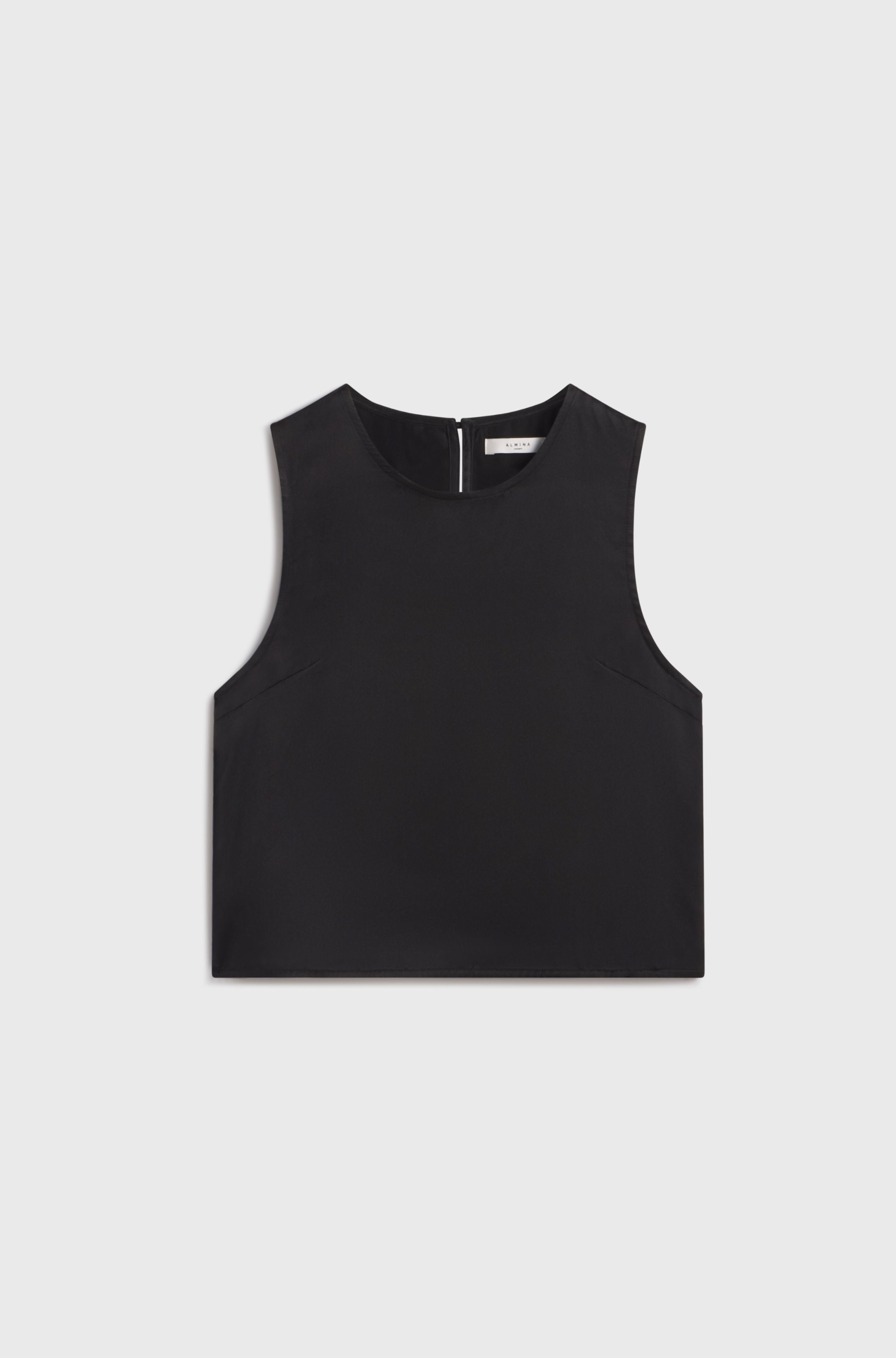 Black sleeveless silk top on a light gray background