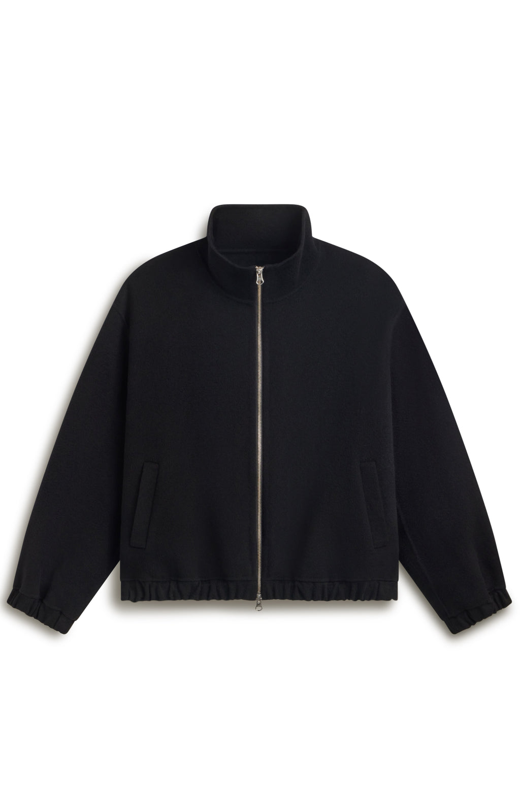 Black wool bomber jacket against a light grey wall
