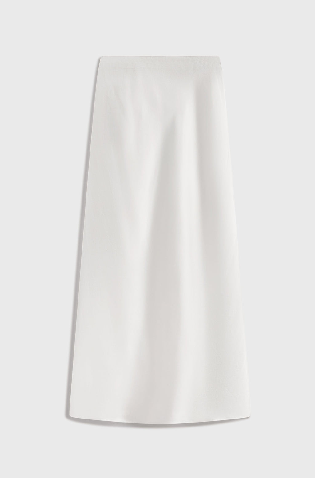 White silk skirt on a light gray background