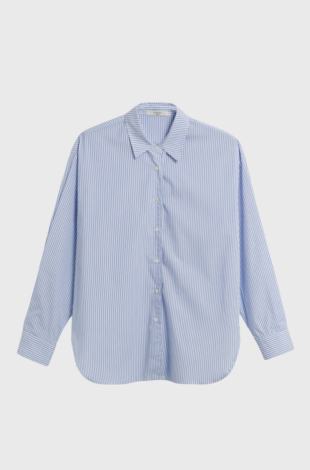 Blue and white striped shirt on a light gray background