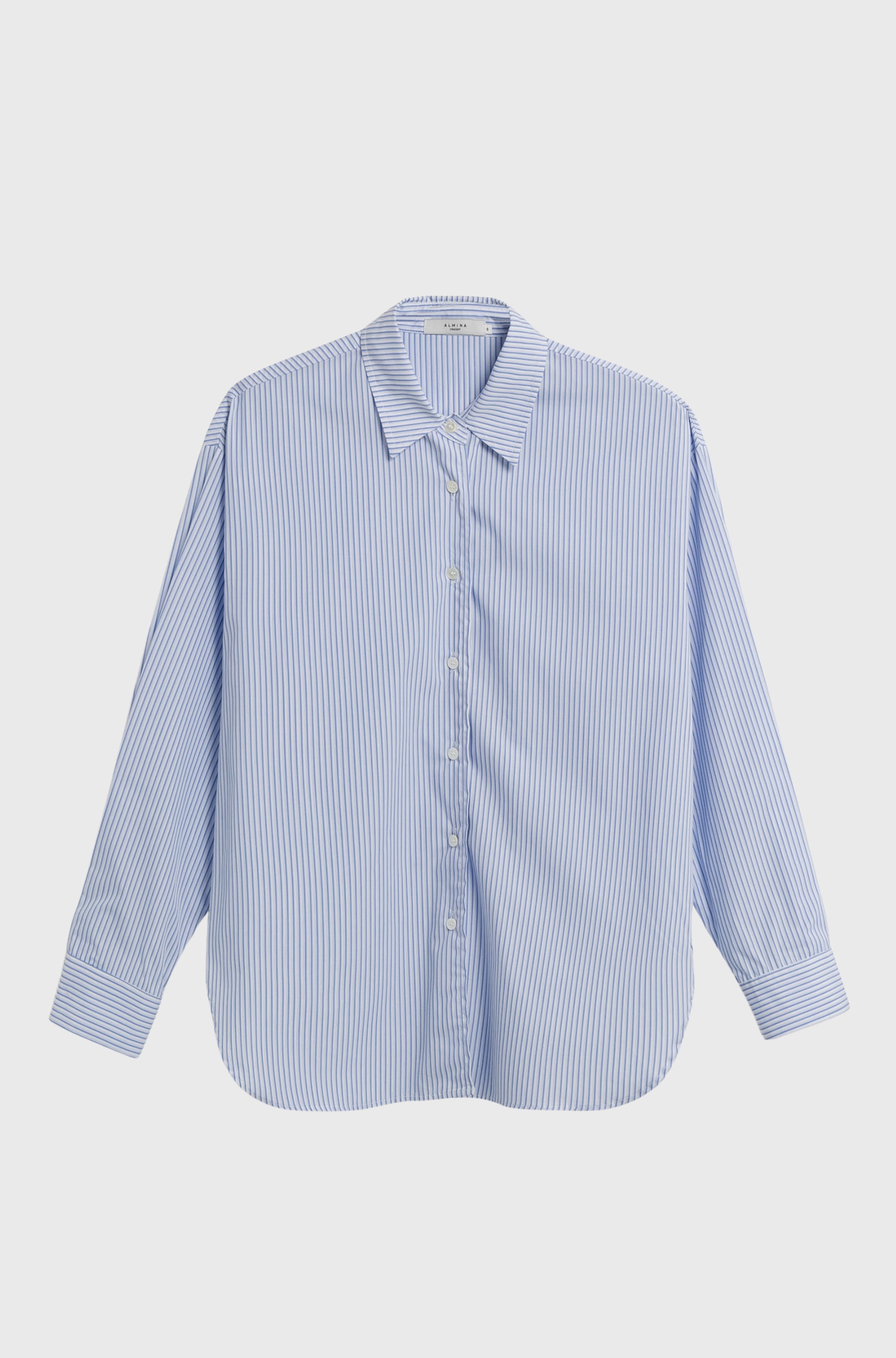 Blue and white striped shirt on a light gray background