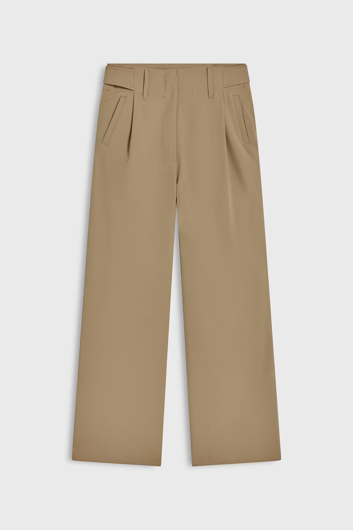 Beige trouser pants on a light gray background