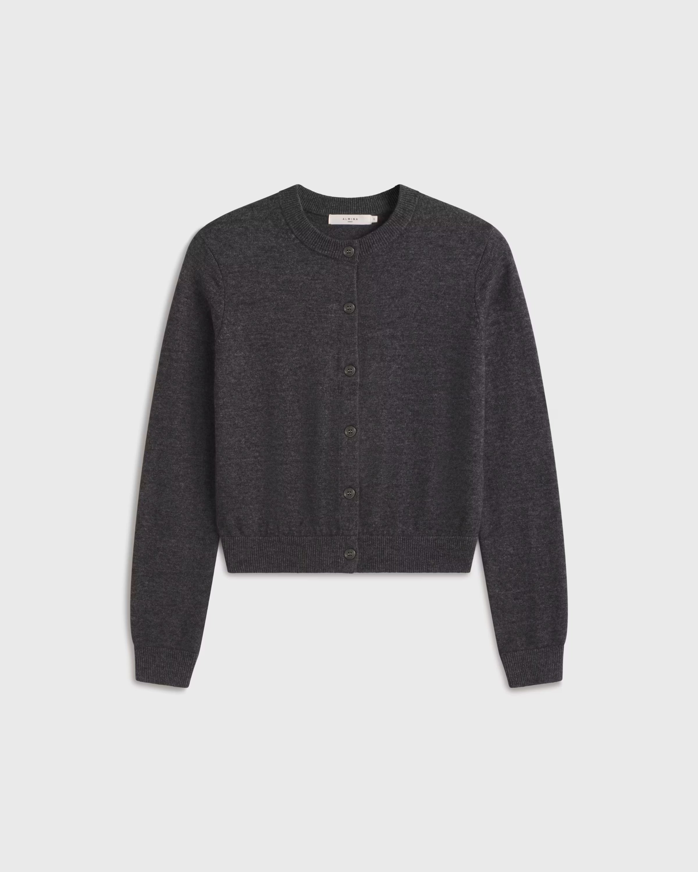 Dark gray button up cardigan on a light gray background